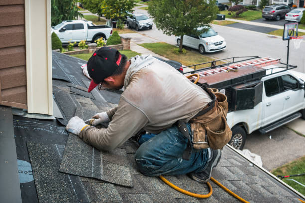 Professional Roofing technician working in Cambridge, ID